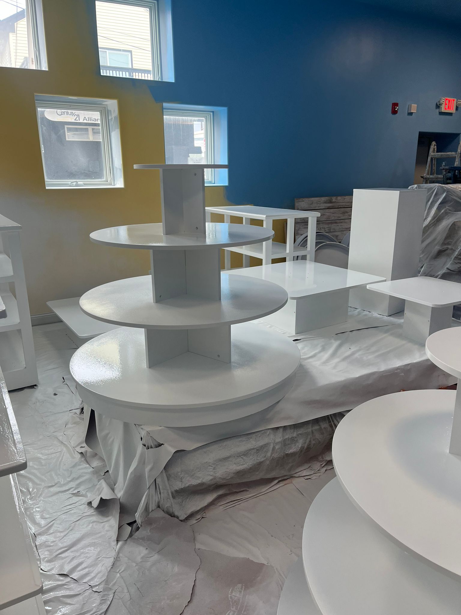 Commercial display furniture with professional white paint finish